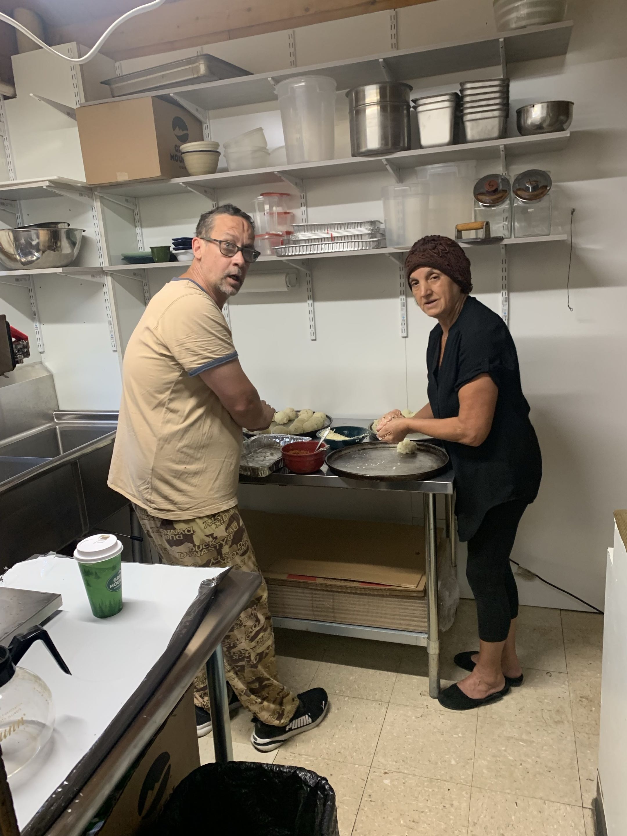 Phil and Nonna making dough in the Way Station kitchen